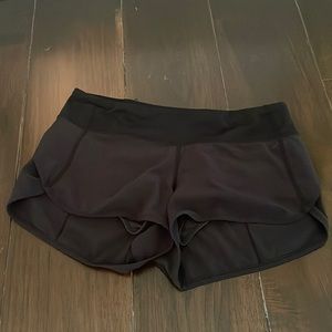 Black Lululemon athletic shorts